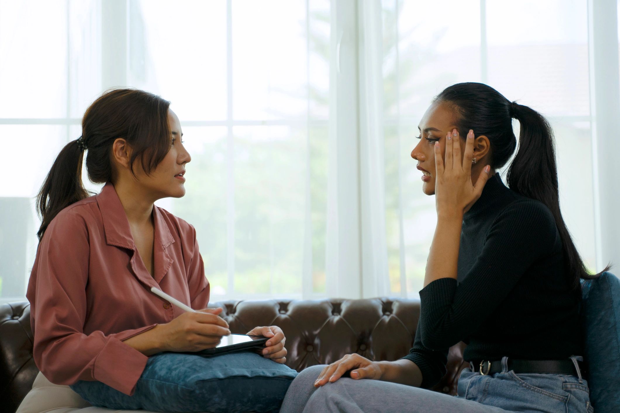 Therapist meeting with a client in a counseling session