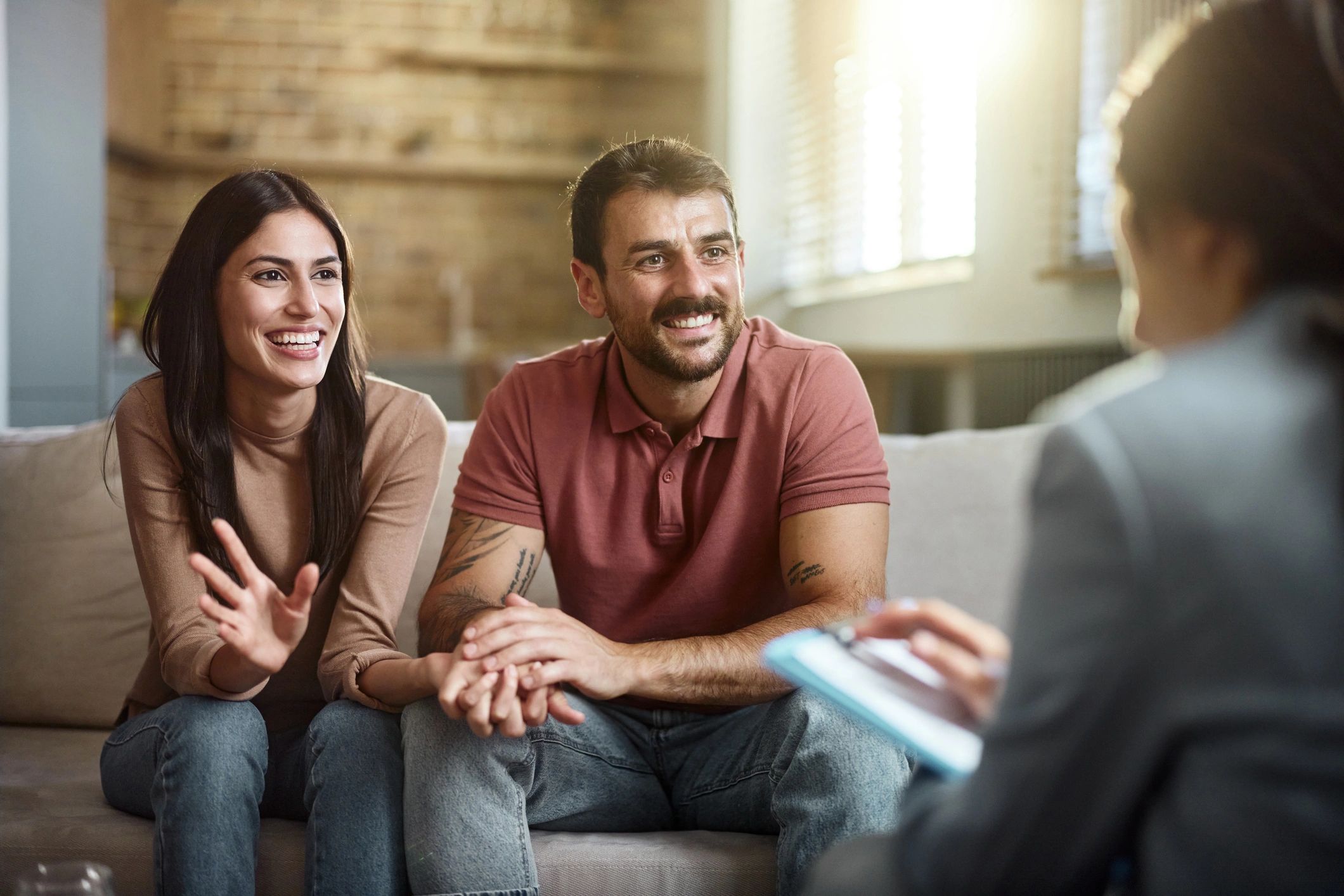 Supportive counseling session with clients and therapist